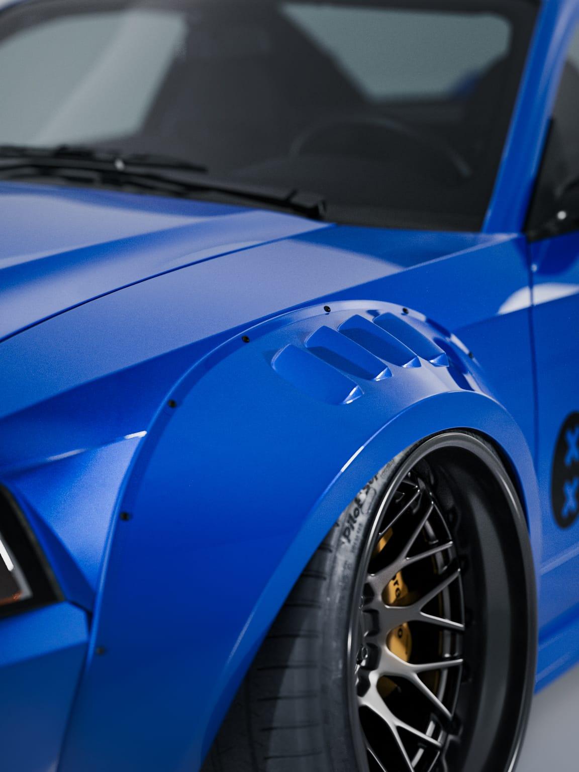 Blue 1999-2004 Mustang SN95 Cobra wide-body kit by SHIROKAI with aggressive wheel arch and black rim