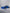 Blue 1999-2004 Mustang SN95 Cobra wide-body kit by SHIROKAI on a sleek custom Mustang