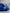Blue 1999-2004 Mustang SN95 Cobra wide-body kit by SHIROKAI showing rear and side fender details