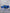 Blue 1999-2004 Mustang SN95 Cobra wide-body kit by SHIROKAI on a lowered Mustang with custom wheels
