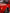 Red car fitted with SHIROKAI 1999-2004 Mustang SN95 Cobra wide-body kit showcasing detailed wide fender and black custom wheel