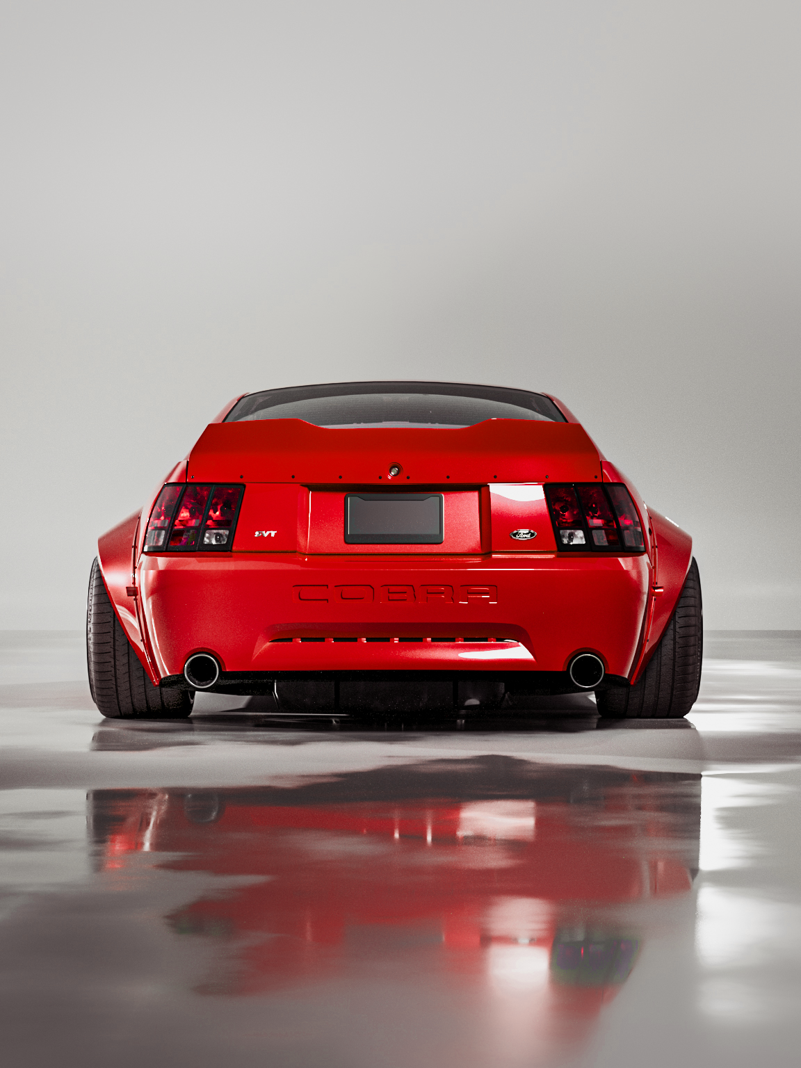 Red 1999-2004 Mustang SN95 Cobra wide-body kit rear view with flared fenders and dual exhaust