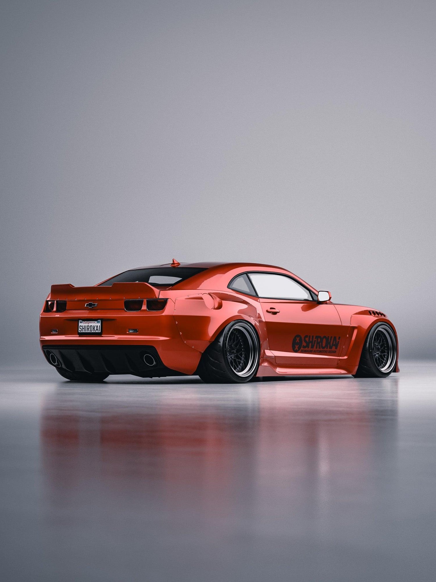 Orange Chevrolet Camaro with Chevrolet Camaro ducktail duckbill spoiler SHIROKAI installed on rear