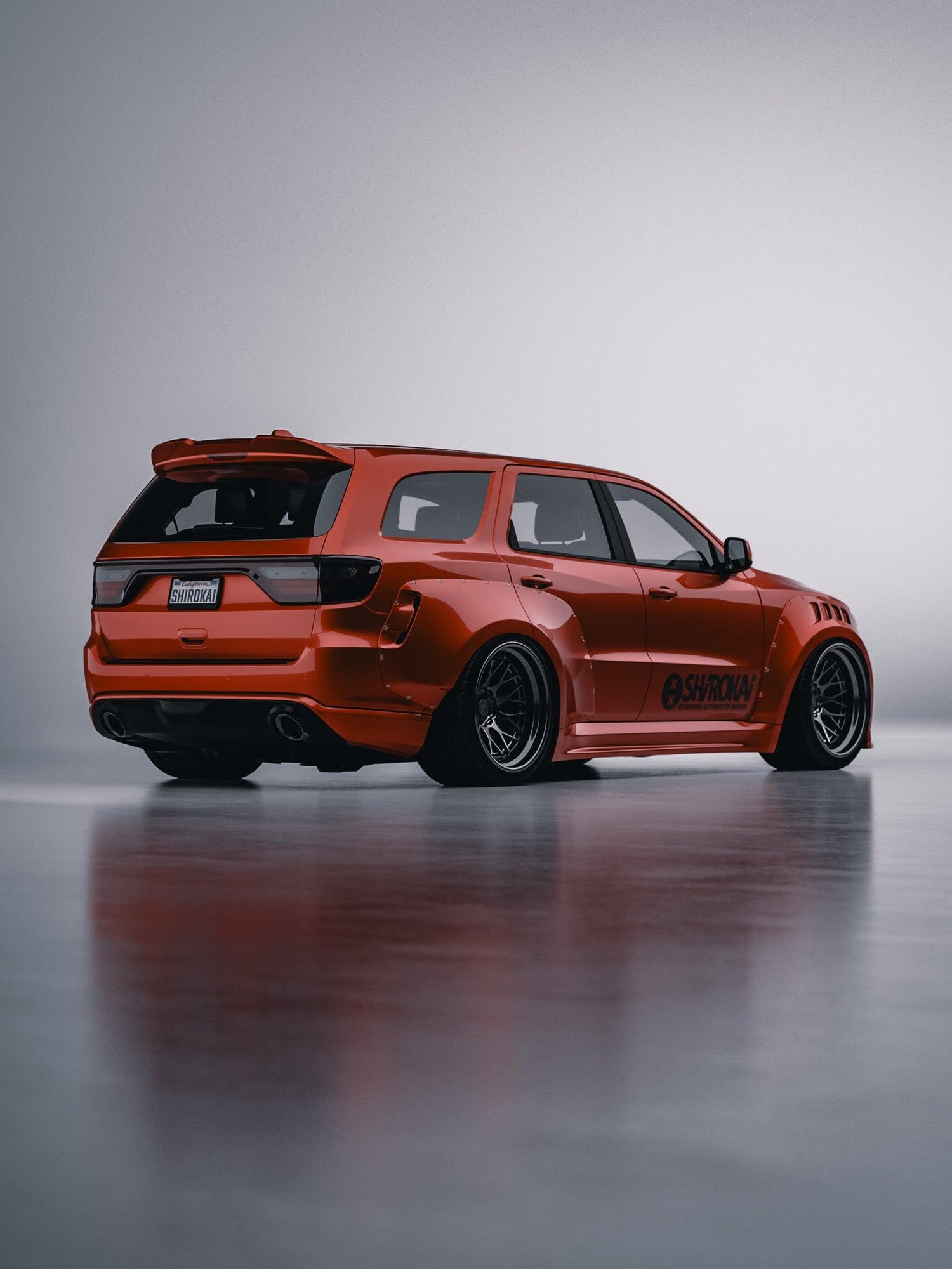 SHIROKAI ducktail spoiler on orange Dodge Durango showcasing Dodge Durango roof rear trunk spoiler