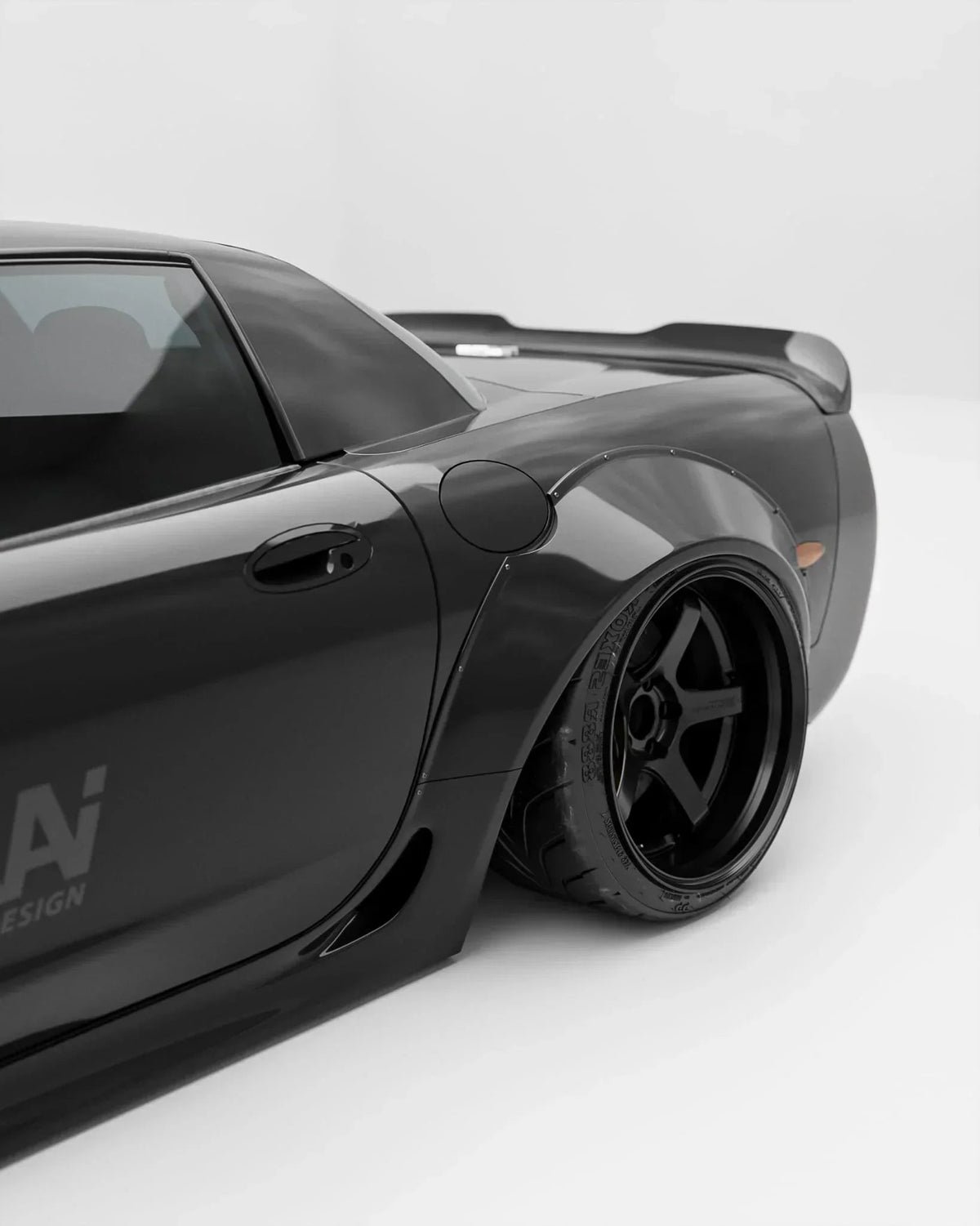SHIROKAI Corvette C5 spoiler — rear quarter view; spoiler only