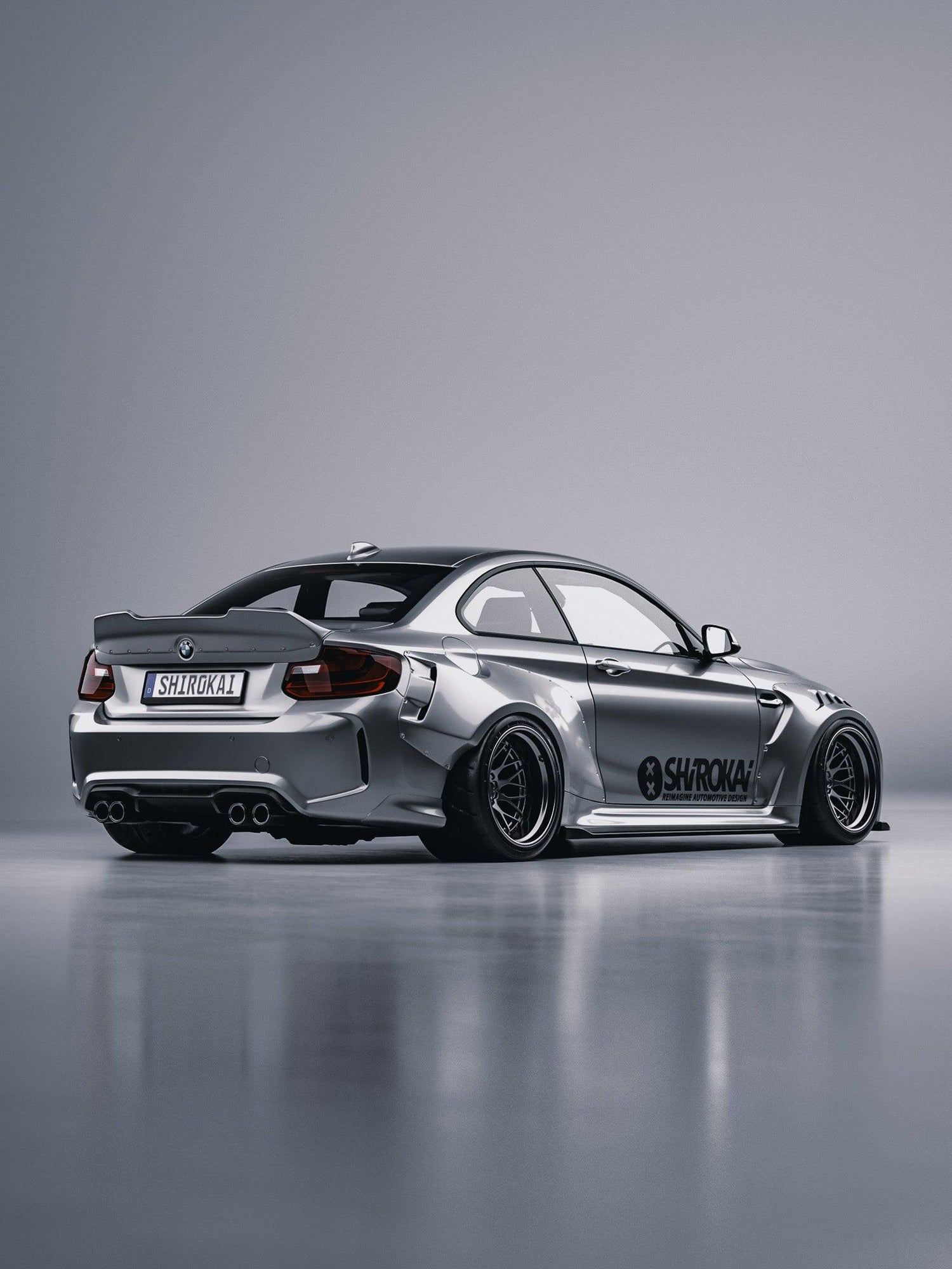 BMW M2 F87 with SHIROKAI ducktail trunk spoiler performance lid in silver color on race-style wide body car
