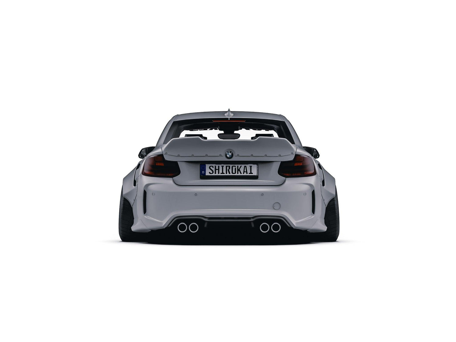 SHIROKAI BMW M2 F87 ducktail trunk spoiler performance lid installed on white BMW car rear view