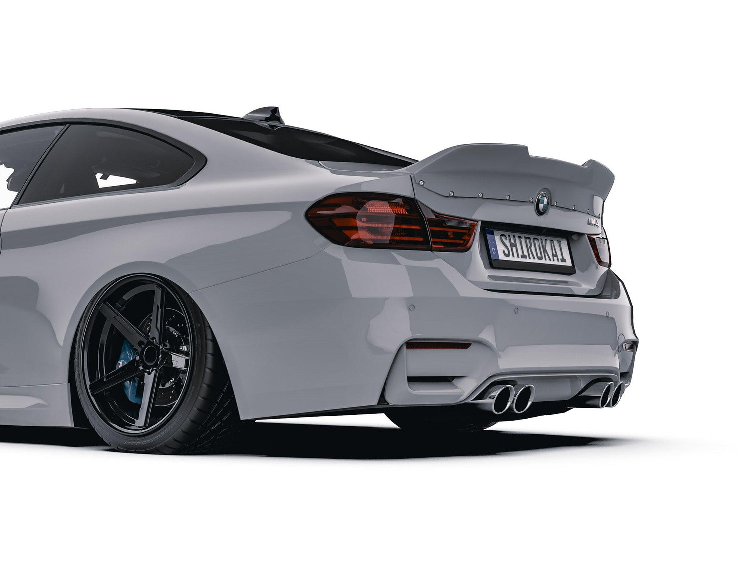 BMW M4 F82 with SHIROKAI ducktail trunk lid spoiler performance in matte gray on a white background