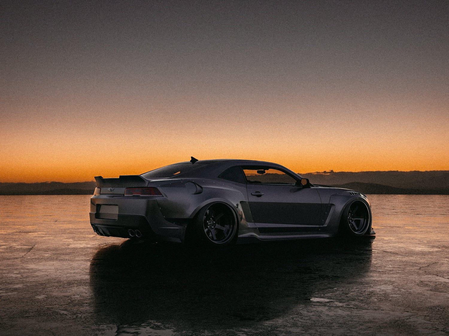 Chevrolet Camaro 5gen SS RS widebody kit SHIROKAI installed on a sleek car at sunset on reflective ground