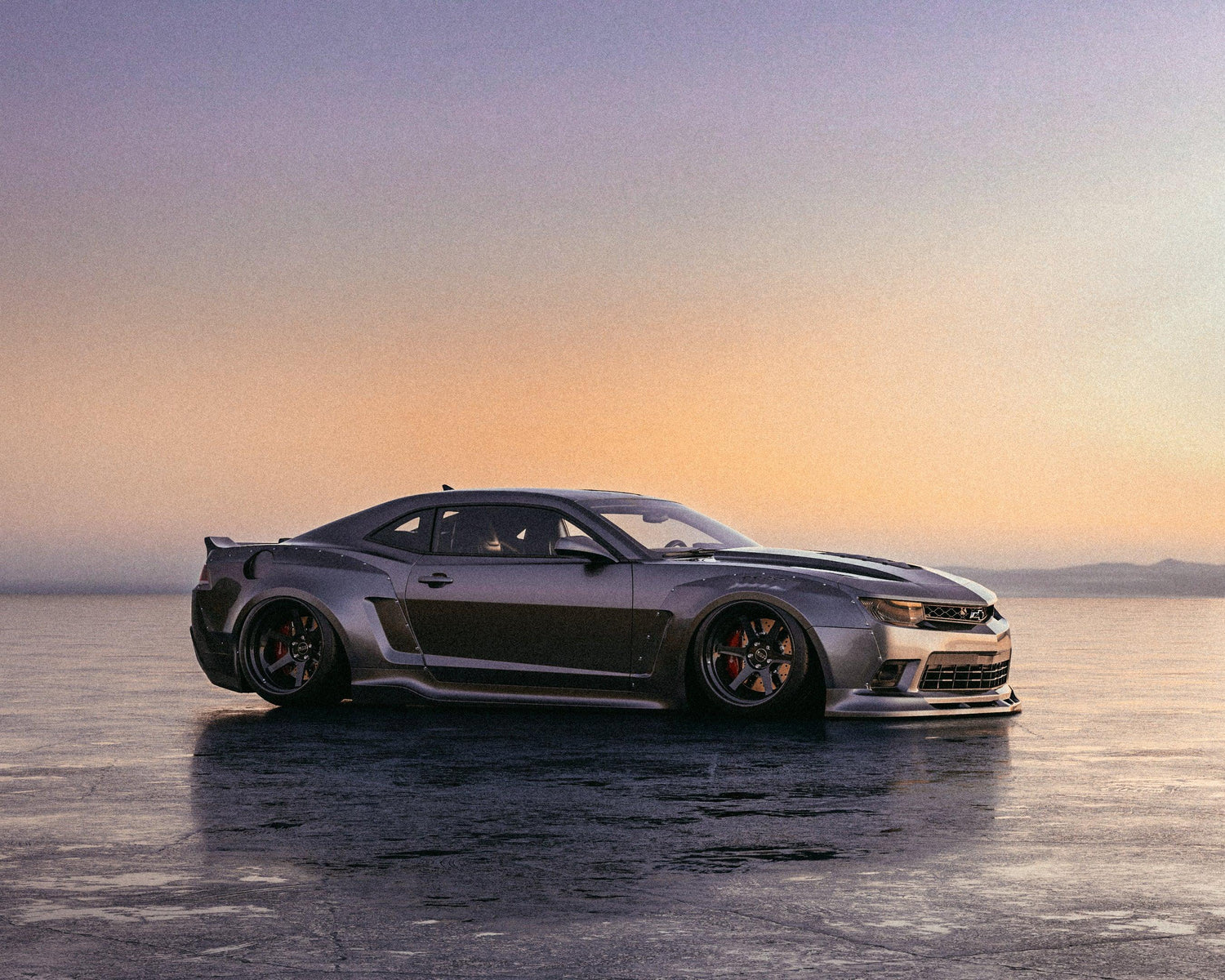 Chevrolet Camaro 5gen SS RS widebody kit SHIROKAI installed on sleek gray sports car at sunset