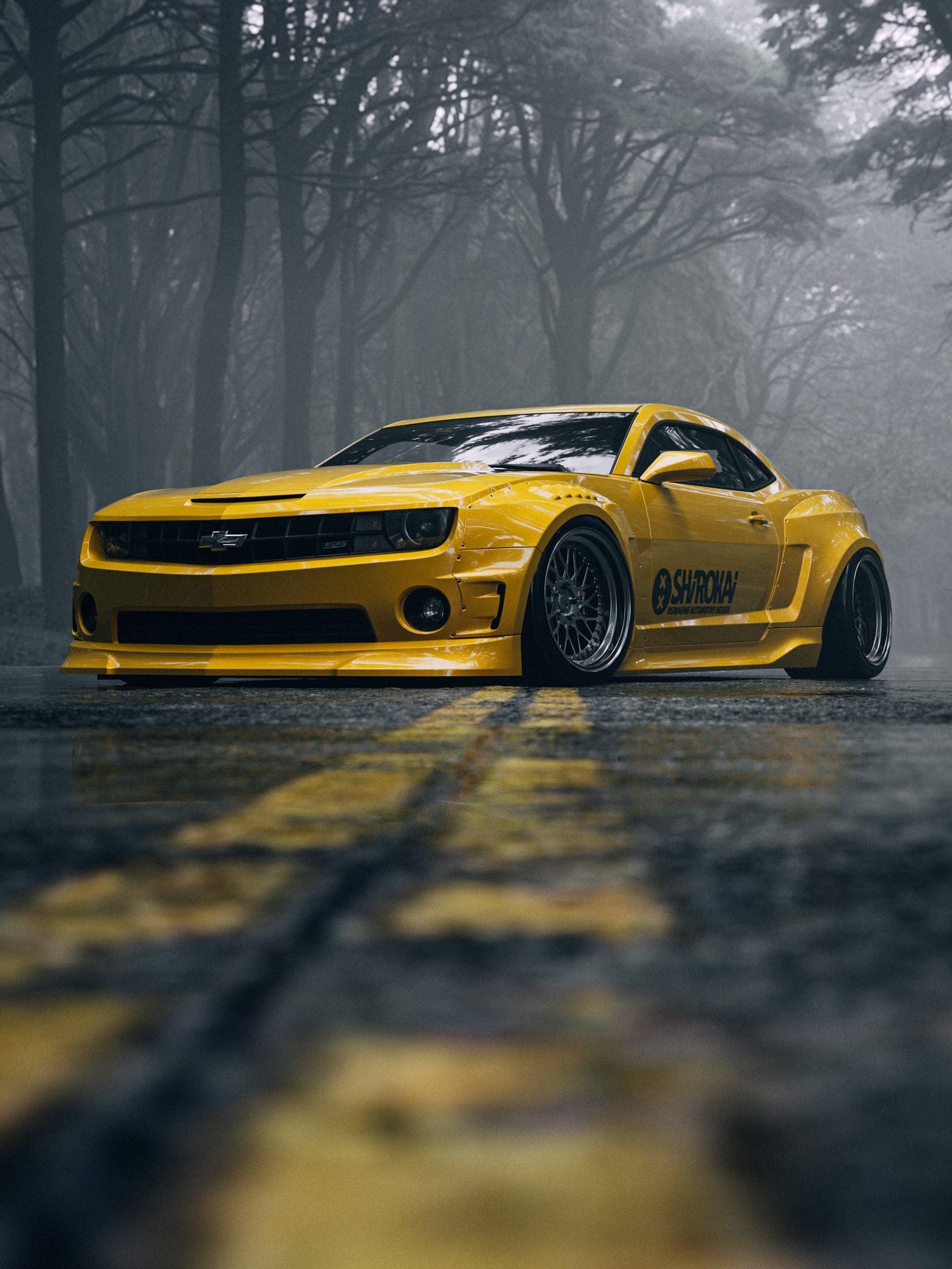 Yellow Chevrolet Camaro SS 2010-2013 widebody kit SHIIROKAI overfenders parked on foggy road with forest background