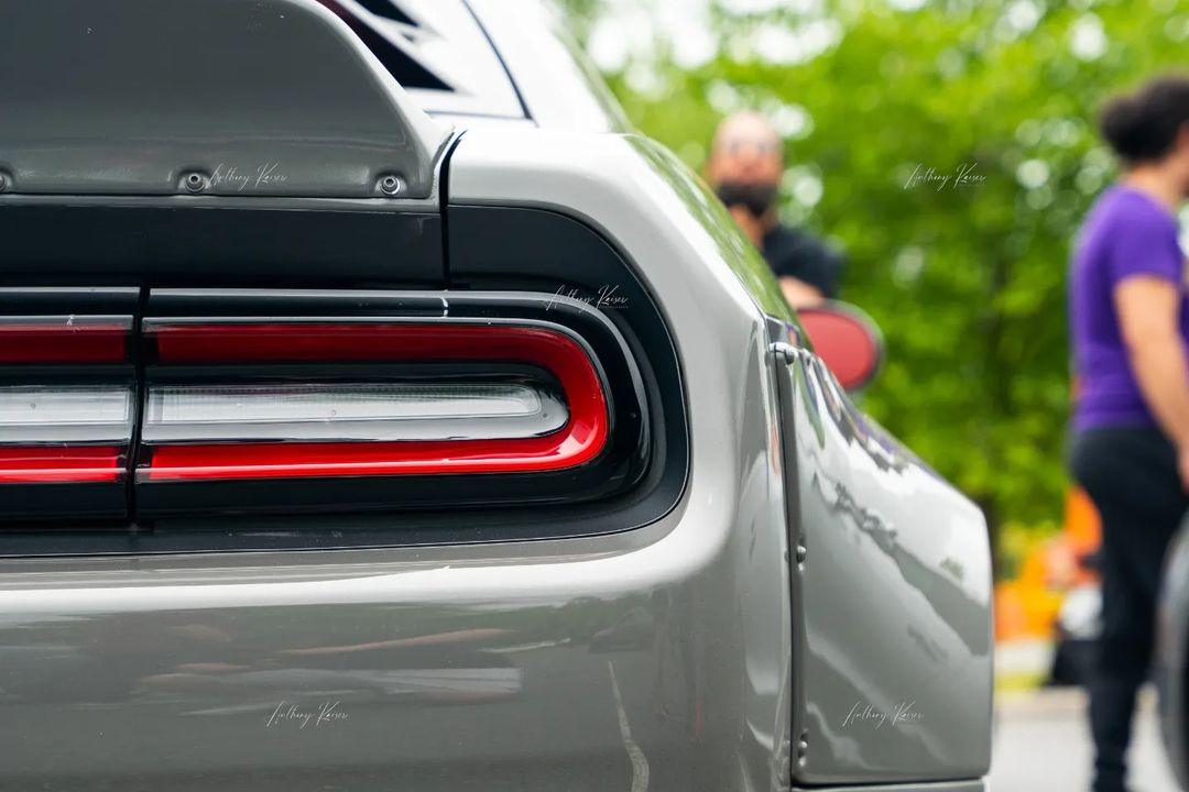 Close-up rear view of Dodge Challenger with HELLCAT SHIROKAI widebody kit in matte gray finish