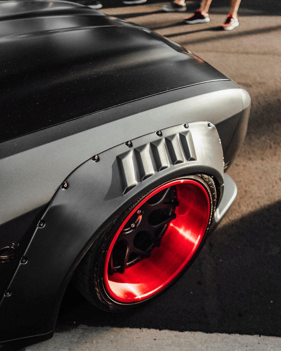 Dodge Challenger HELLCAT SHIROKAI widebody kit installed with matte black fender and red deep dish wheel