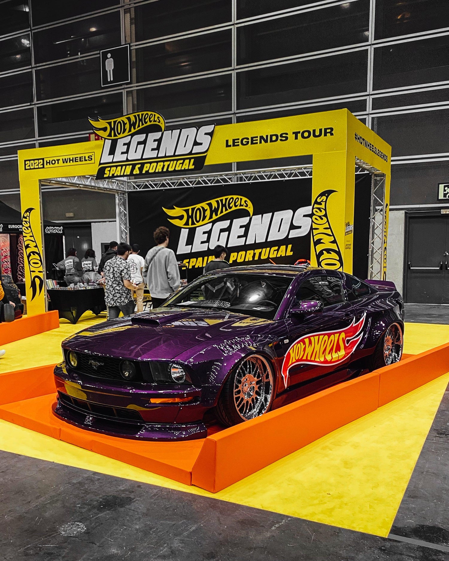 Ford Mustang S197 widebody kit SHIROKAI in purple with Hot Wheels decals displayed at Legends Tour event