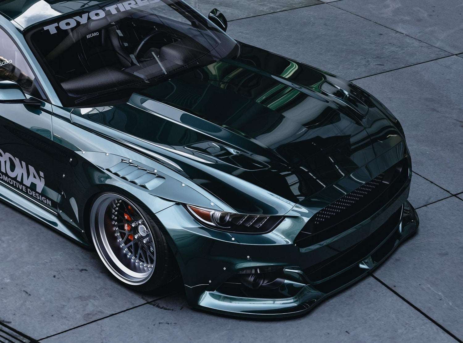 Ford Mustang S550 widebody kit SHIROKAI installed on dark green Mustang with custom wheels
