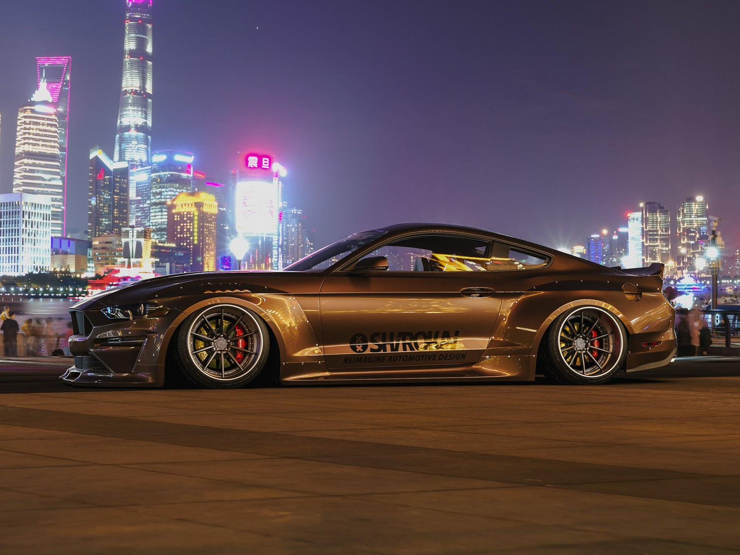 Ford Mustang S550 widebody kit SHIROKAI installed on bronze muscle car parked at night in city