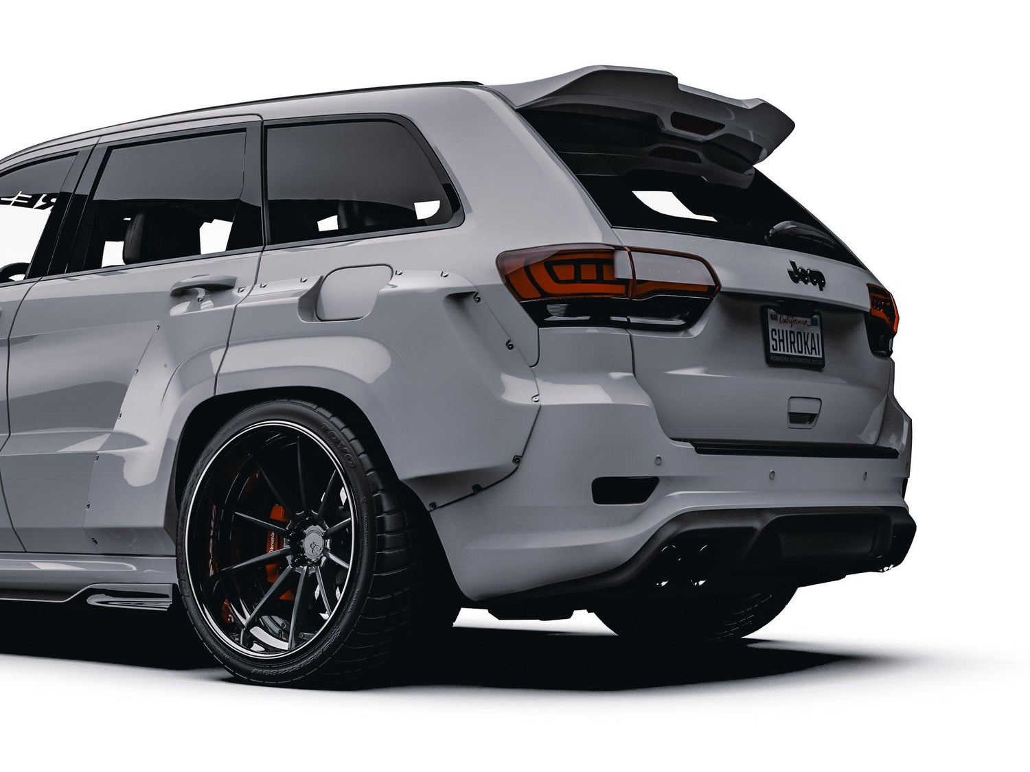 Jeep Grand Cherokee Trackhawk SRT rear door spoiler SHIROKAI ducktail spoiler installed on white SUV rear