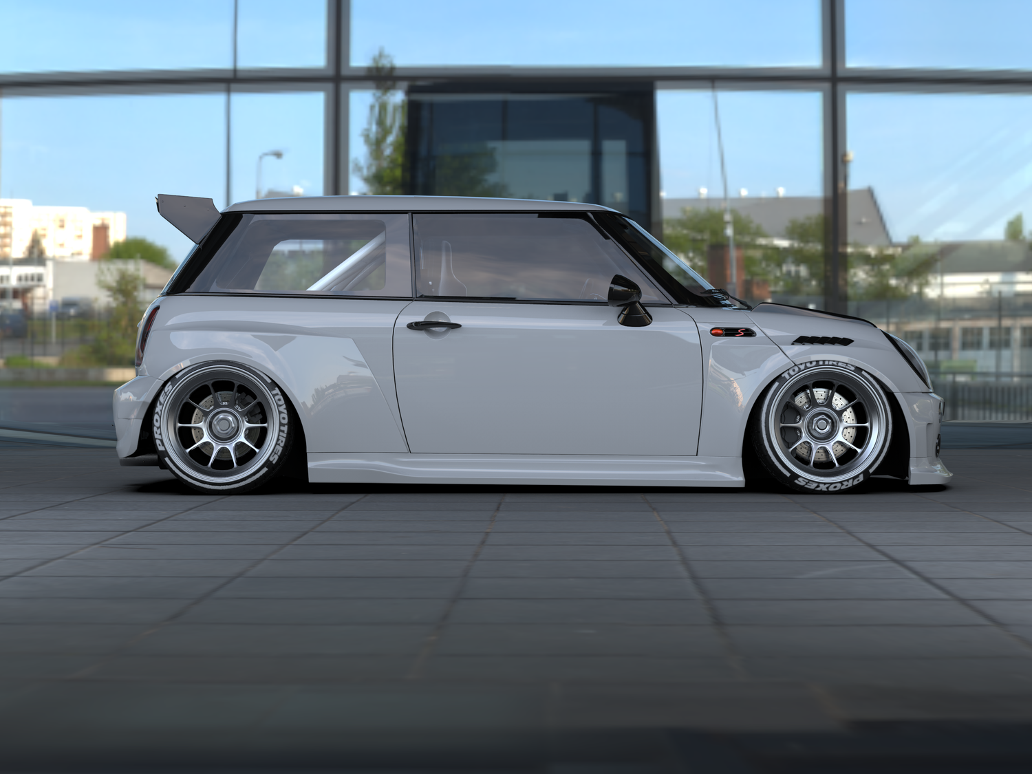 Mini Cooper S R53 widebody kit SHIROKAI installed on a gray Mini Cooper with lowered suspension and custom wheels