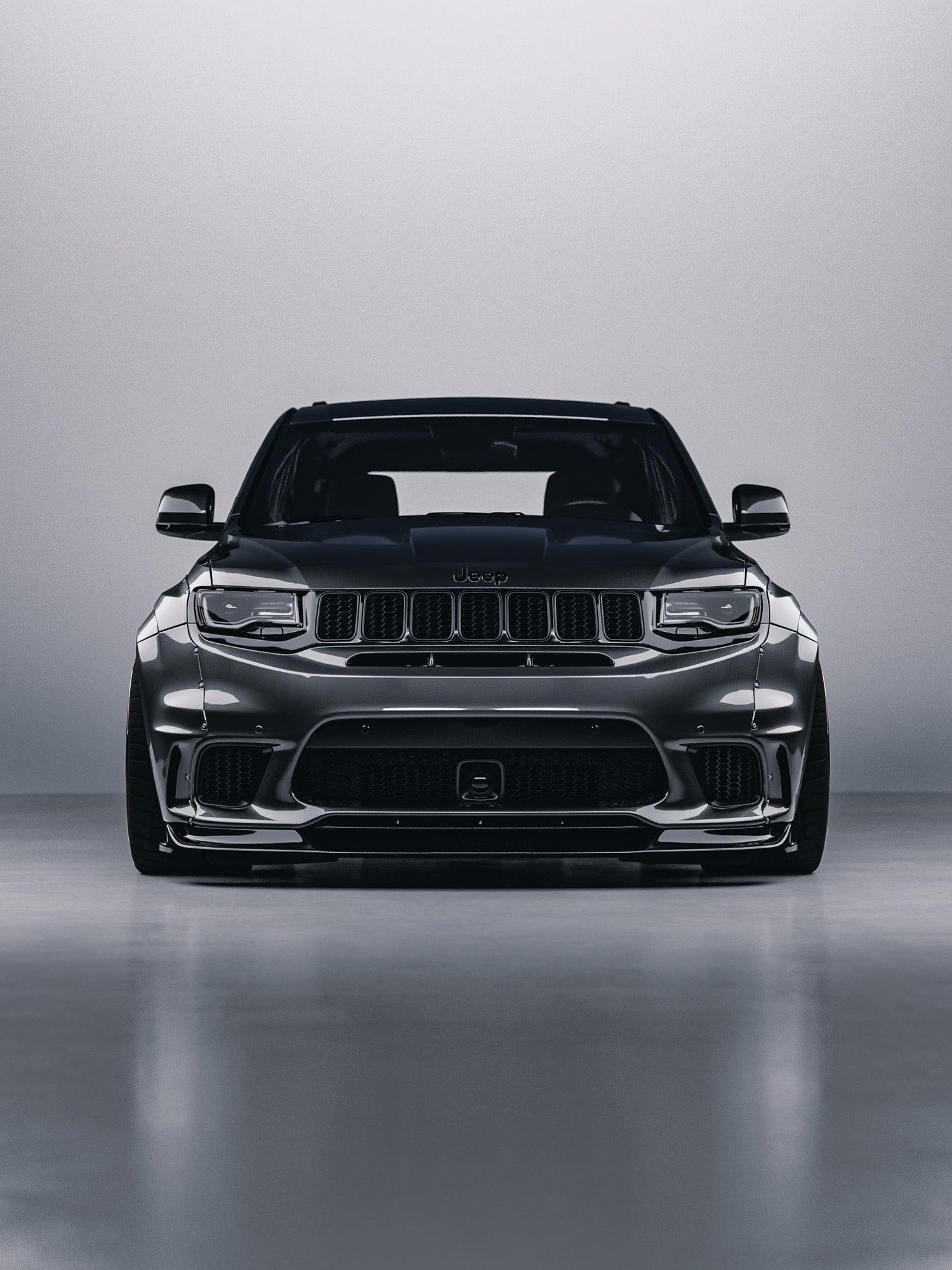 Front view of a black Jeep Grand Cherokee SRT Trackhawk with SHIROKAI widebody kit installed