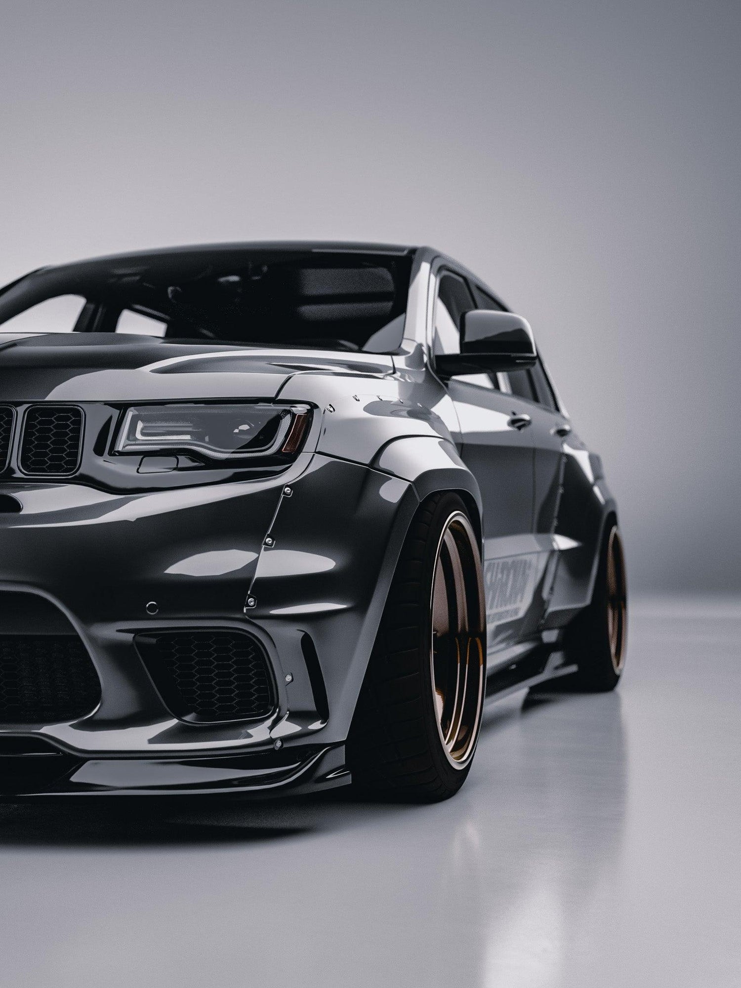 Jeep Grand Cherokee SRT Trackhawk widebody kit SHIROKAI on a sleek gray car with bronze wheels