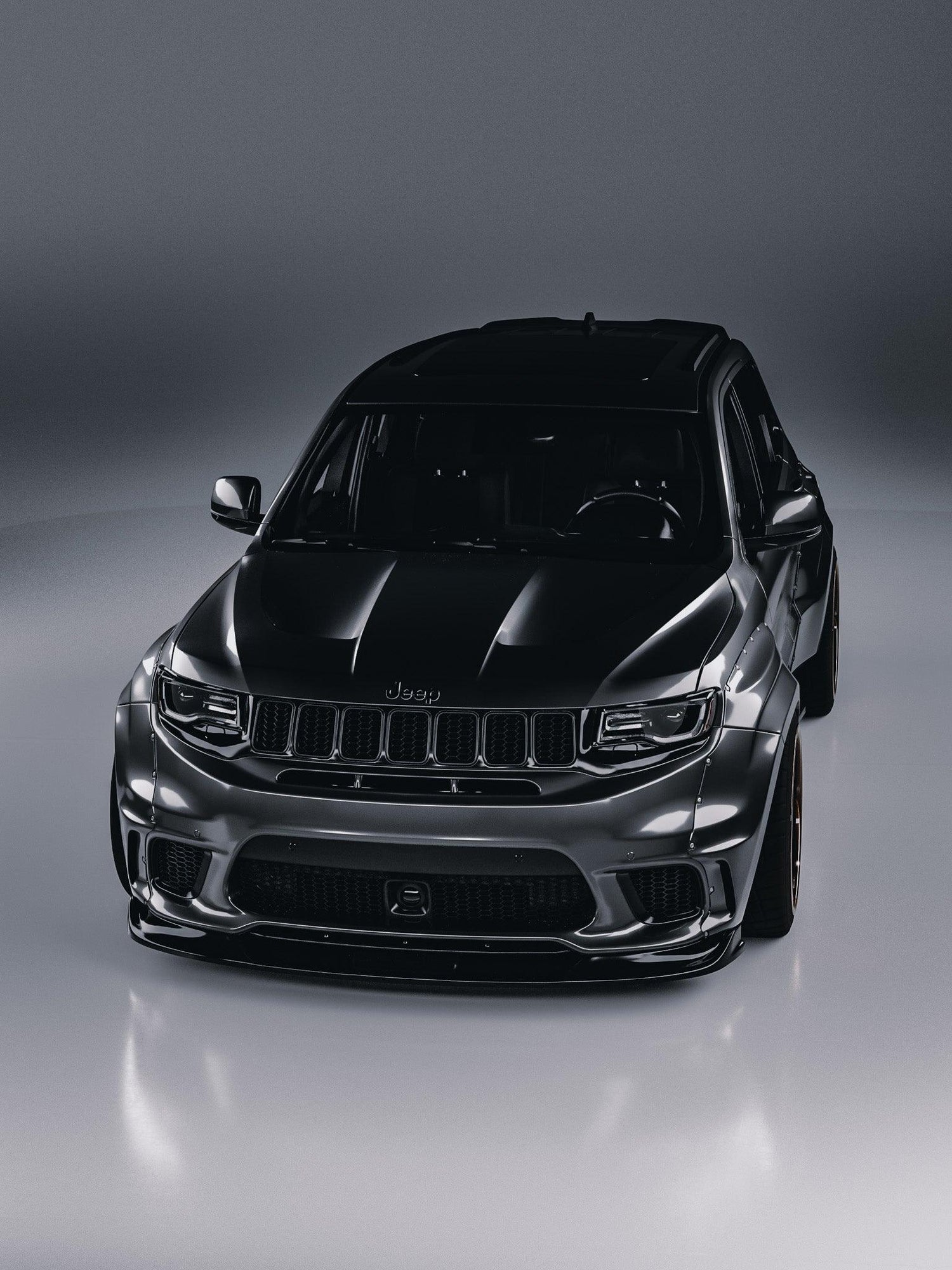 Black Jeep Grand Cherokee SRT Trackhawk with widebody kit SHIROKAI front view on gray background