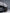 Jeep Grand Cherokee SRT Trackhawk widebody kit SHIROKAI installed on black SUV rear side with bronze wheels