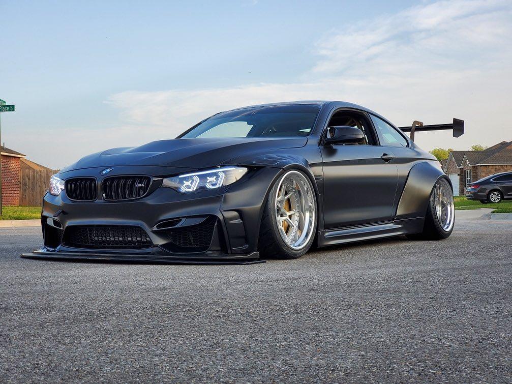 Black BMW M4 F82 with widebody kit for BMW M4 F82 2014-2020 SHIROKAI stance bimmer parked on street