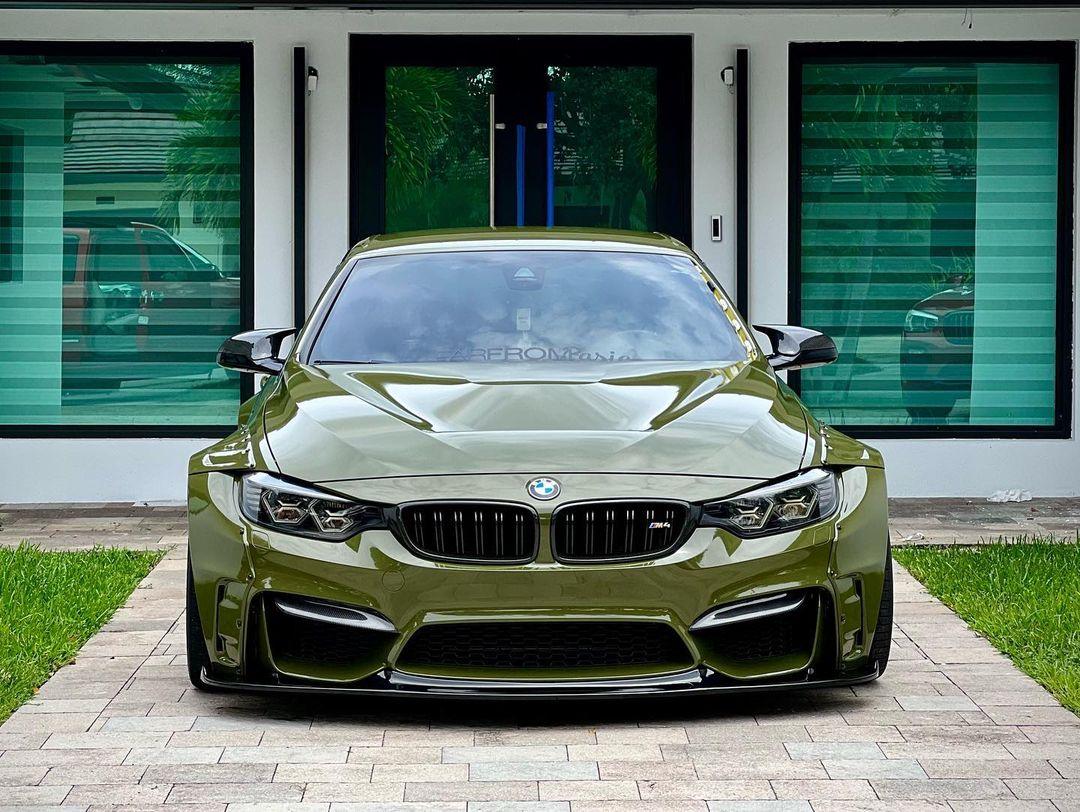 Front view of green BMW M4 F82 2014-2020 with widebody kit for BMW M4 F82 2014-2020 SHIROKAI stance bimmer