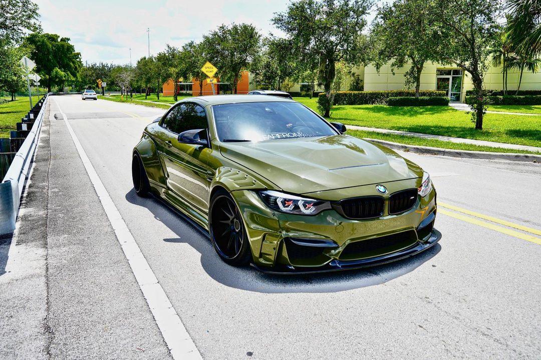 Green BMW M4 F82 2014-2020 with SHIROKAI widebody kit for BMW M4 F82 2014-2020 SHIROKAI stance bimmer on street