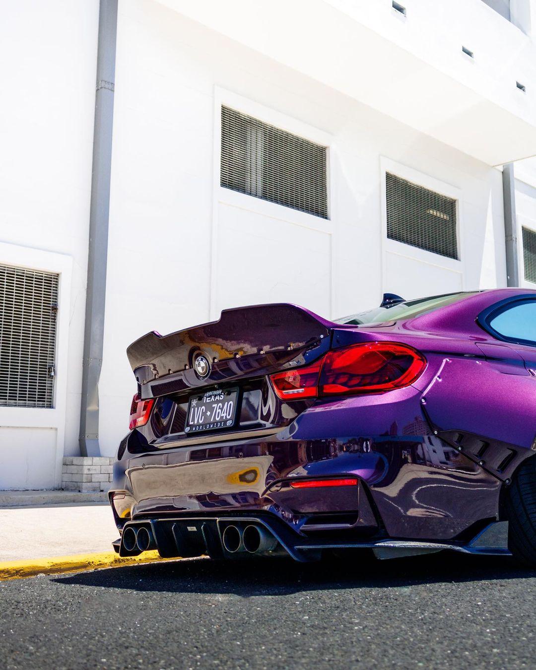 Purple BMW M4 with widebody kit for BMW M4 F82 2014-2020 SHIROKAI stance bimmer parked outdoors