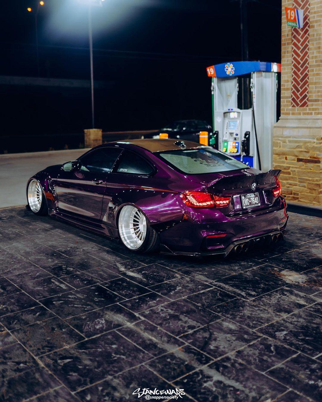 Widebody kit for BMW M4 F82 2014-2020 SHIROKAI stance bimmer in metallic purple at gas station