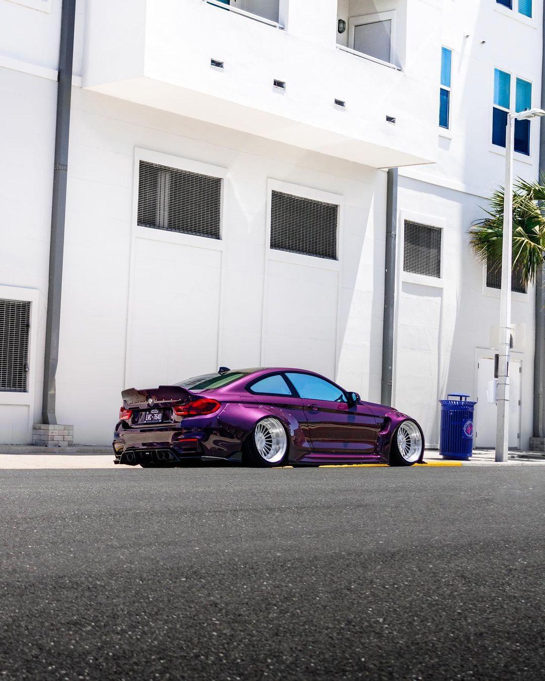 Purple BMW M4 F82 2014-2020 with widebody kit for BMW M4 F82 2014-2020 SHIROKAI stance bimmer parked on street